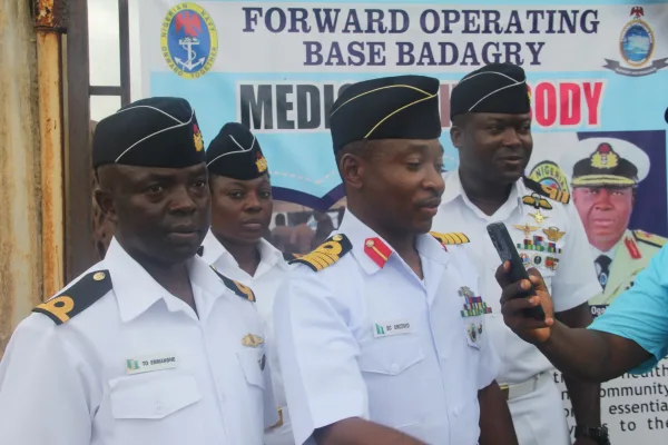 Navy Marks 69th Year with Medical Aid in Topo